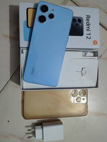 Redmi 12 (8+8/128) with box+Charger. 1