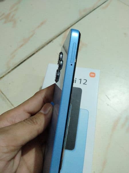 Redmi 12 (8+8/128) with box+Charger. 4