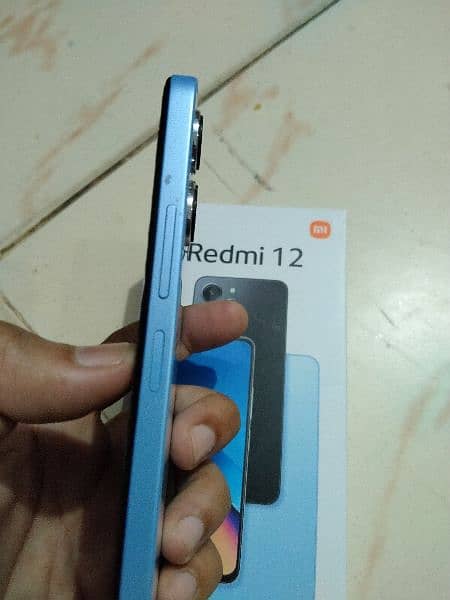 Redmi 12 (8+8/128) with box+Charger. 5