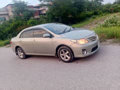 Toyota Corolla GLI 2010 Islamabad number 0