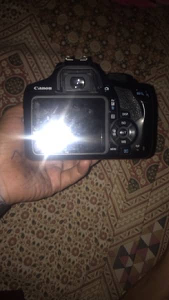 canon camera 1300D 0