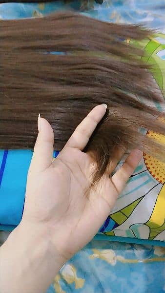 one time used  23 inch long (full head) hair extension 1