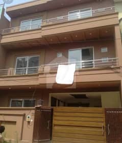 7 Marla Triple Storey Building Fully Furnished For Rent Near Susan Road Madina Town Faisalabad 0