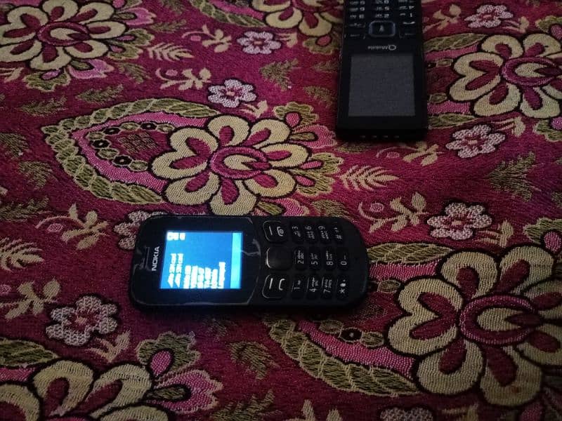 Q mobile and Nokia 130 4