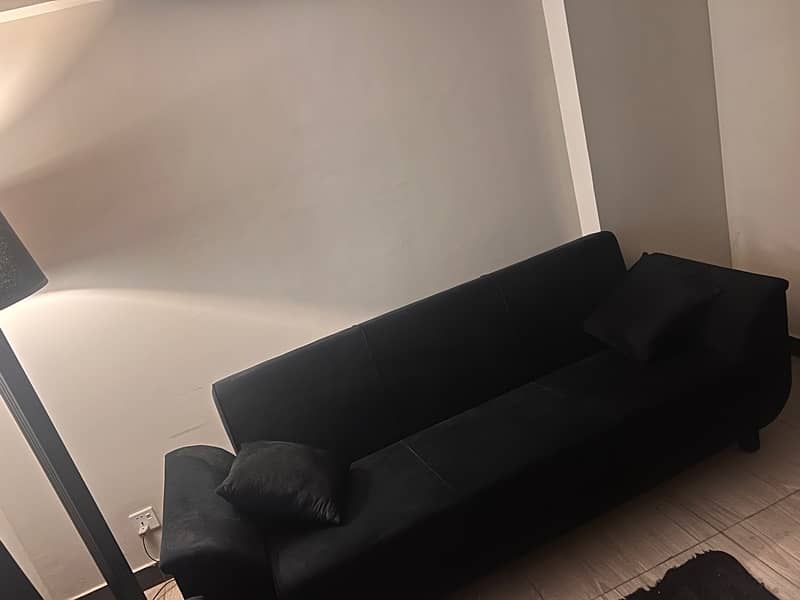 sofa cum bed for sale in black valvet 1