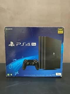 PS4 pro 1tb with original box and 2 controllers 0