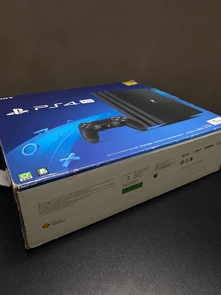 PS4 pro 1tb with original box and 2 controllers 1