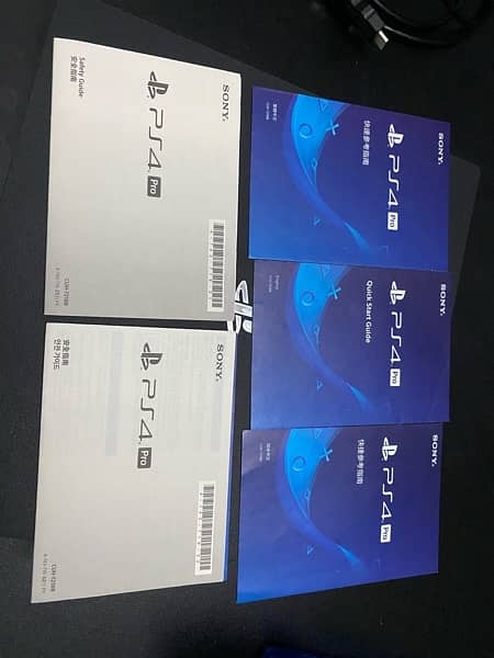 PS4 pro 1tb with original box and 2 controllers 8