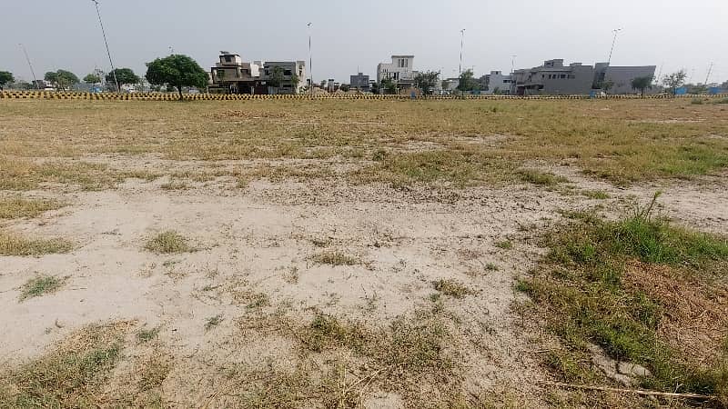 On 100 Feet Road Total 4 Kanal- Pair Of 1 Kanal Top Location Plot No- 3252- 3253 - 3254 - And 3255 Block Y Phase 7 DHA Lahore For Urgent Sale 10