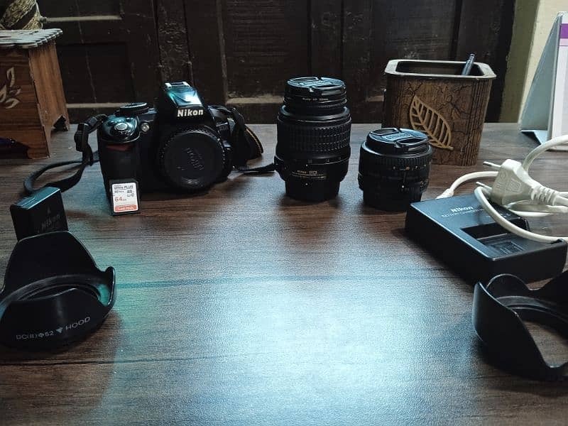 Nikon D3100 DSLR With 18 -55 mm And 50mm 1.8D 10