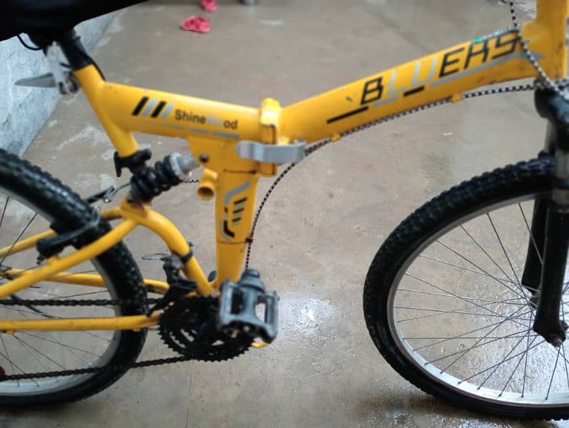 Yellow shine wood foldable bicycle 2