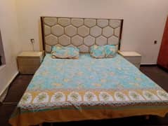 good condition bed with side racks