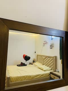 King size bed with side tables dressing table and wall mirror