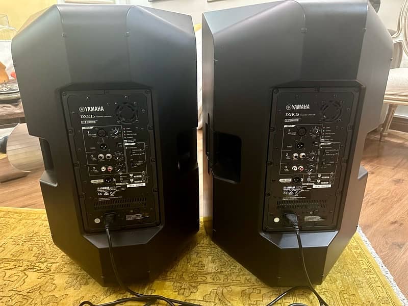 2 Yamaha DXR15 Powered Speakers 1