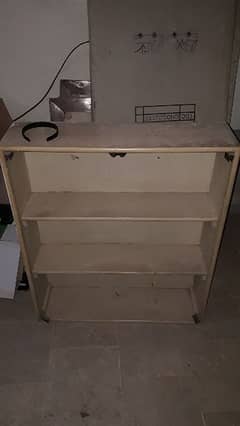 book shelf with front mirrors