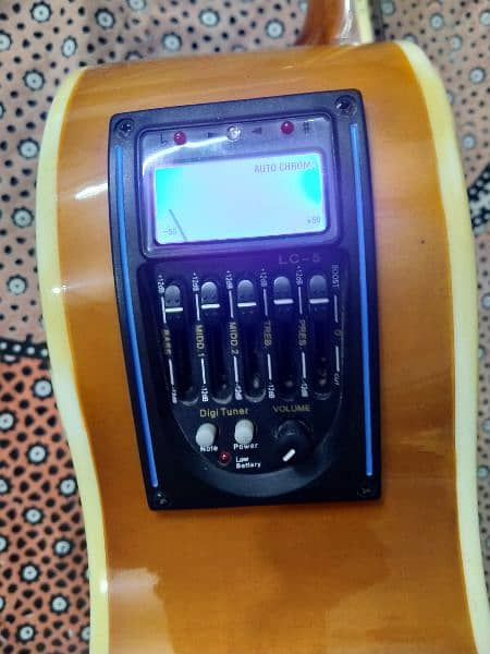 Semi Acoustic Guitar With Digital Tuner Display and Capo 2