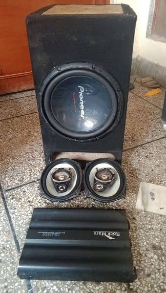 Woofer + AMP + Speakers New Condition. 4