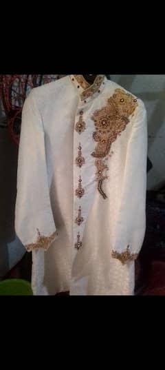 white sharwani for groom 0