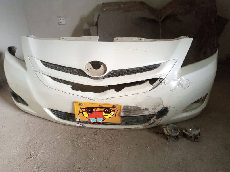 Repairable Toyota Belta used genuine bumper grill fog lamps 1