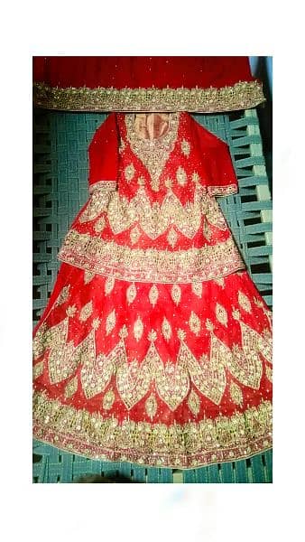 red lehnga  hand made work fresh condition contact 03449802619 2