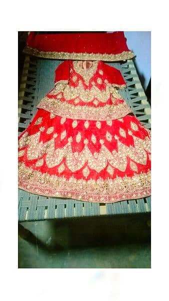 red lehnga  hand made work fresh condition contact 03449802619 3