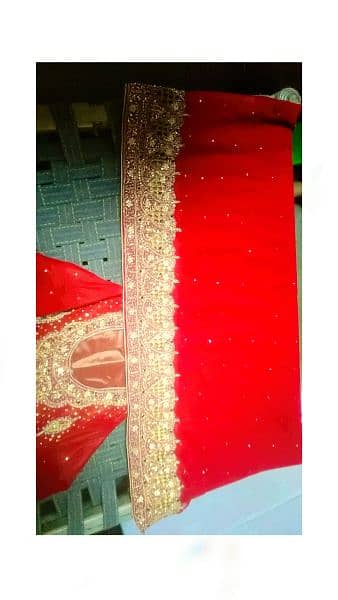 red lehnga  hand made work fresh condition contact 03449802619 7