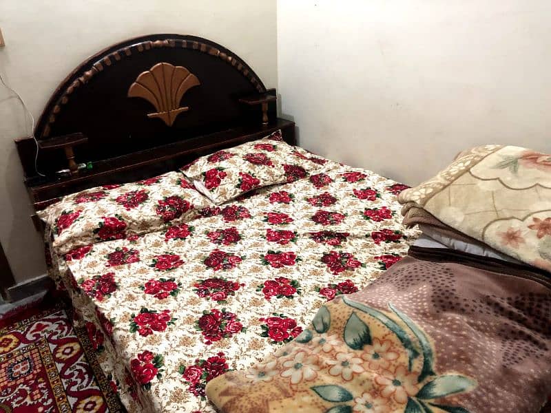 wooden bed with mattress and 2 sidetable 0