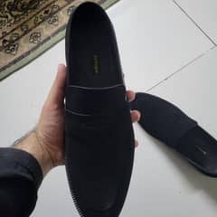 Black suede pennyloafers