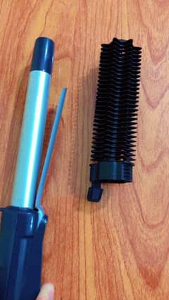 Remington brand new 2 in 1 hair curler 0