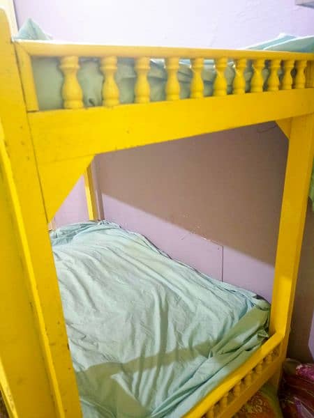 Used wooden bunk bed good condition. 4