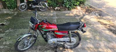 I am selling Honda CG 125 Islamabad number golden number