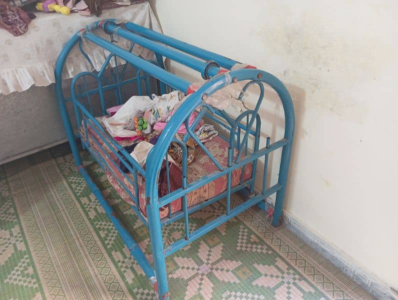 steel bed with three sided almirah 2 chairs 1 rac and 1 baby cort 2