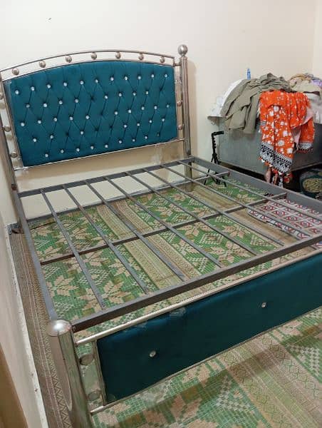 steel bed with three sided almirah 2 chairs 1 rac and 1 baby cort 9