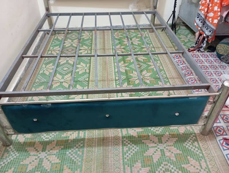 steel bed with three sided almirah 2 chairs 1 rac and 1 baby cort 11