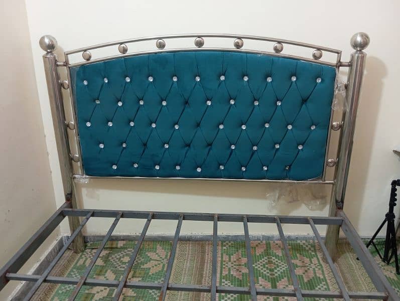 steel bed with three sided almirah 2 chairs 1 rac and 1 baby cort 12