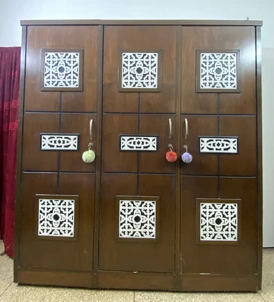 Three Door Wooden Cupboard 1