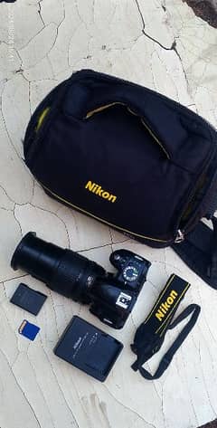 DSLR D3100 Nikon Profieesinol Camera. Lanz 18.135mm Nikon