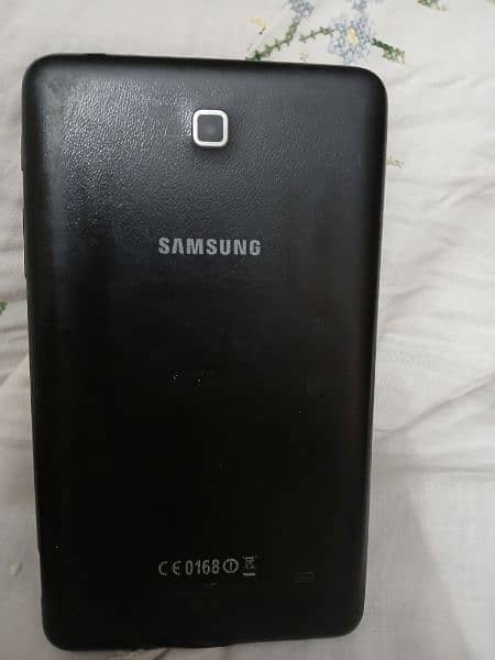 Samsung tablet in Black color along with a cover 1