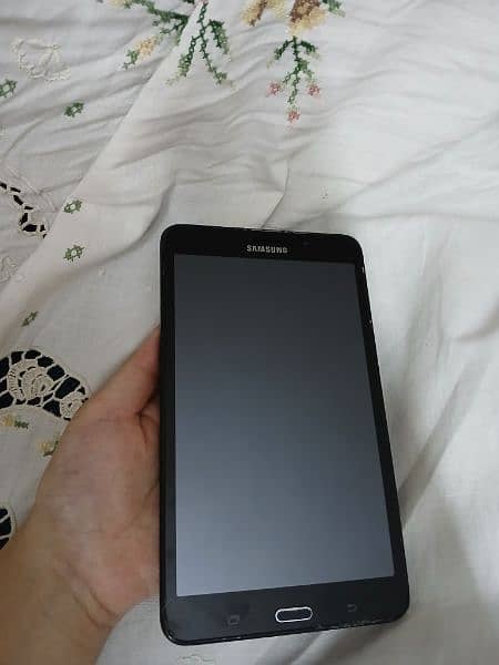 Samsung tablet in Black color along with a cover 2