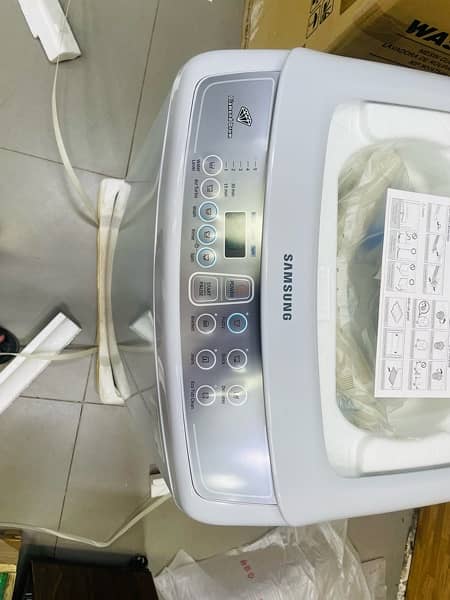 samsung washing machine fully auto and brand new packed . 5