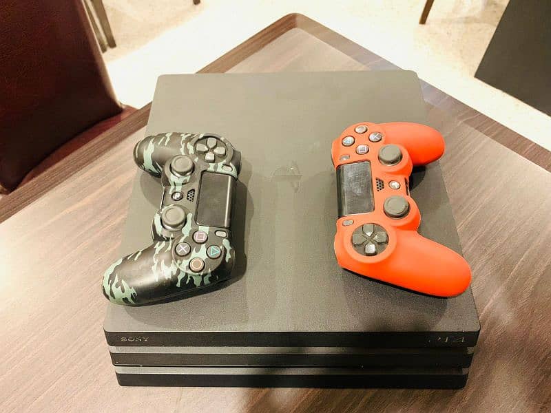 PS4 pro Sony with two controllers 1