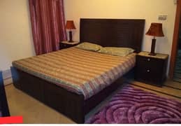 double bed with side tables