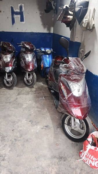 scooties 49cc,electric,100cc contact at 03004142432 11