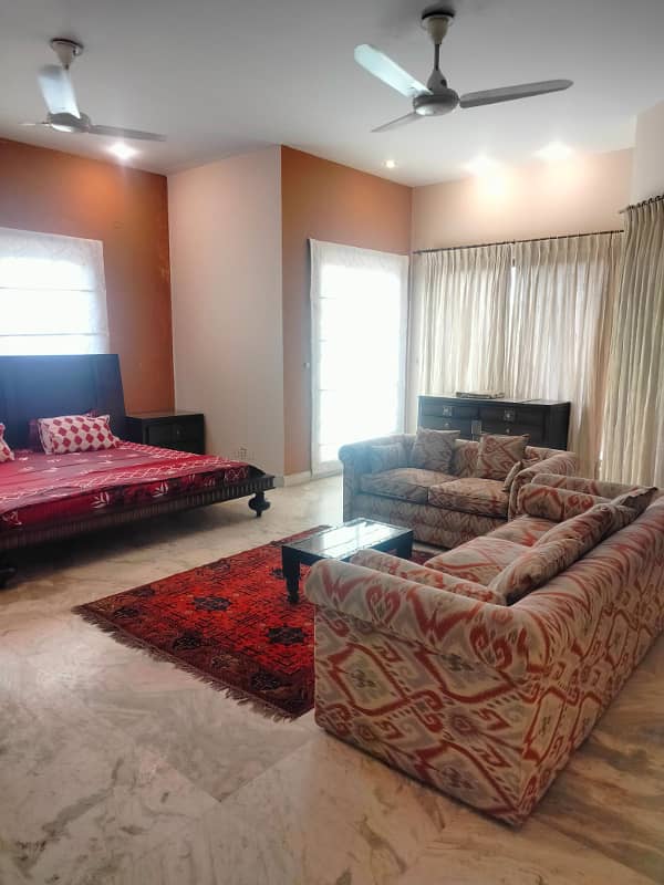 Near Gold Crest Mall- Fully Furnished 10 Marla Adorable Bungalow For Rent in DHA Phase 4 Lahore 8