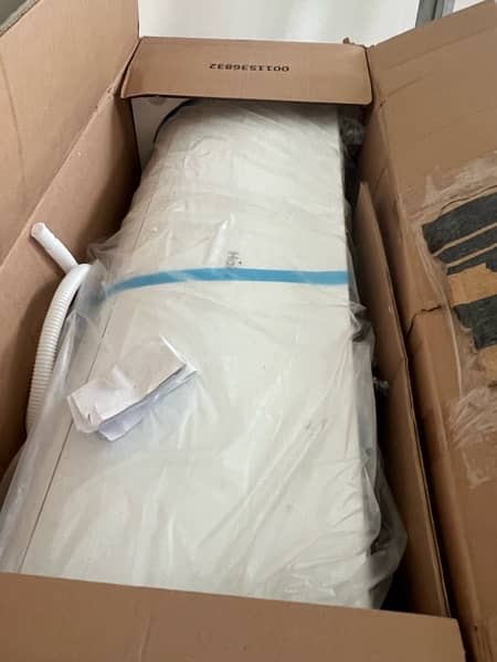 2 ton Haier DC Inverter , hot and cool. packed Carton 1