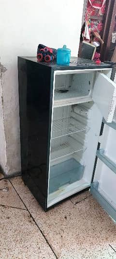 Dawlance - Average sized fridge.