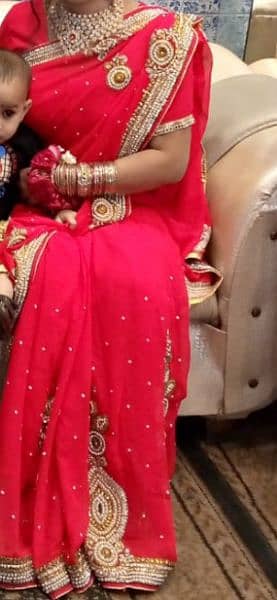 a pink color sari 0