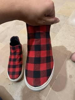 Red and Black check shoes.