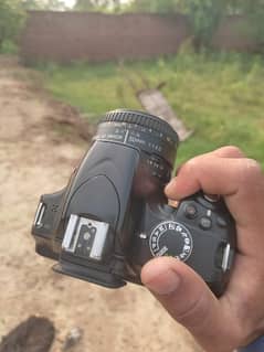 Nikon d3200 with 50mm prime lens.