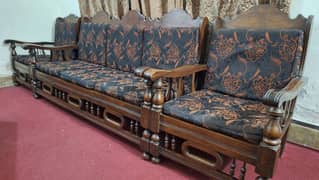 Pure old wooden sofa set with golden cutions is up for sale